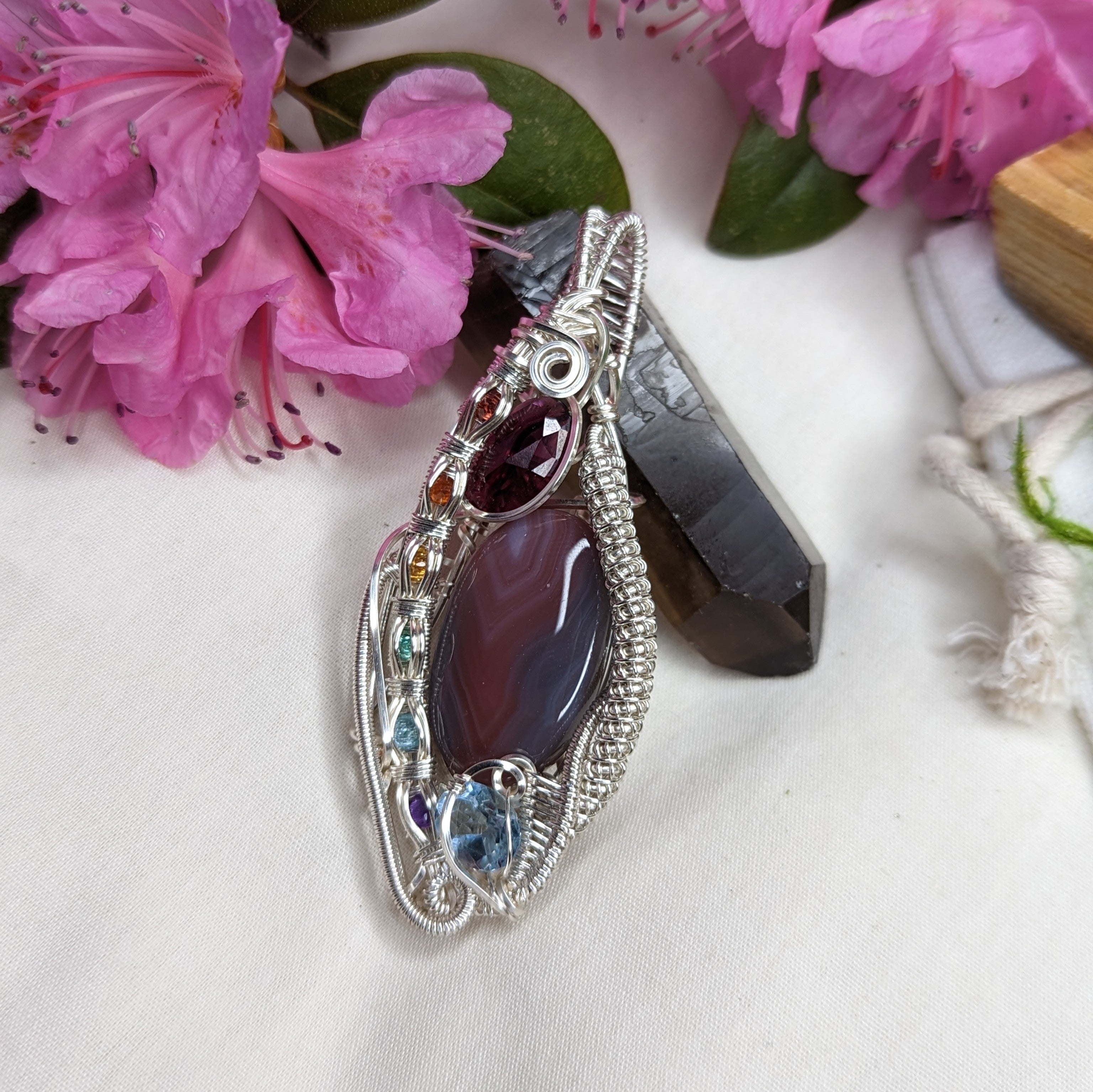 Botswana Agate Pendant with Garnet, Blue Topaz with a Rainbow Channel Setting ~ Wire Wrapped~ Includes Silver Chain - Earth Family Crystals