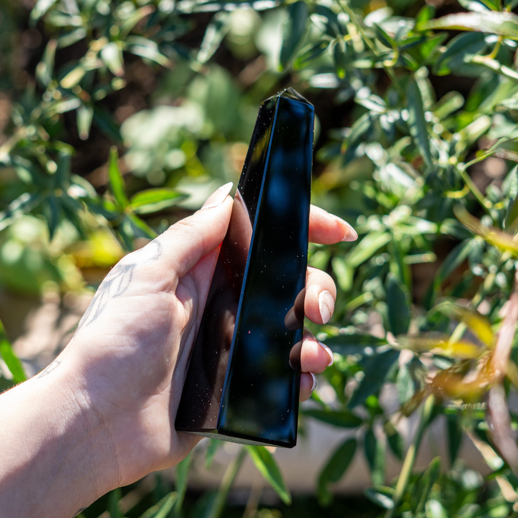 Black Obsidian obelisk crystal carving