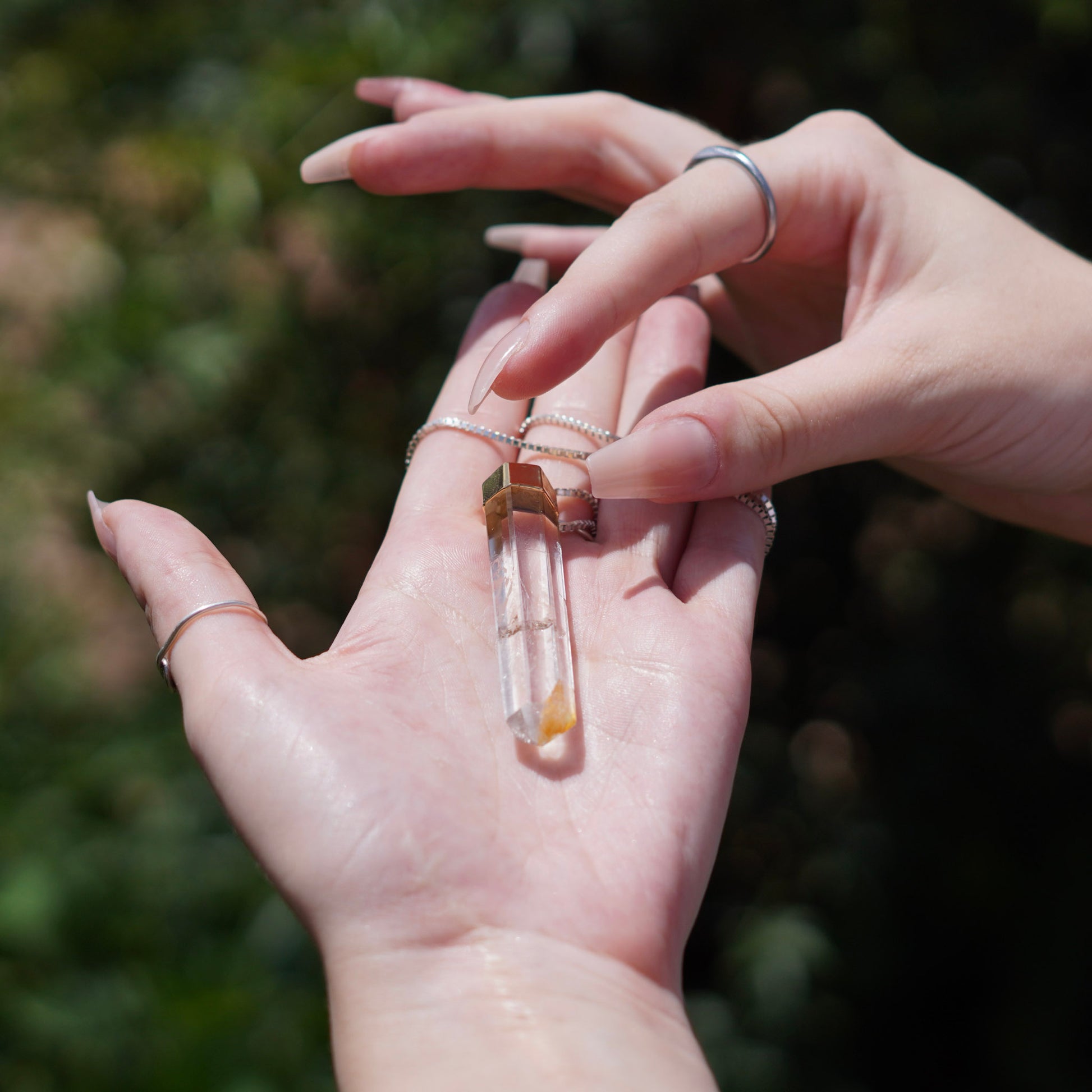 Brazilian Quartz Crystal Pendant with Hematoid Inclusions