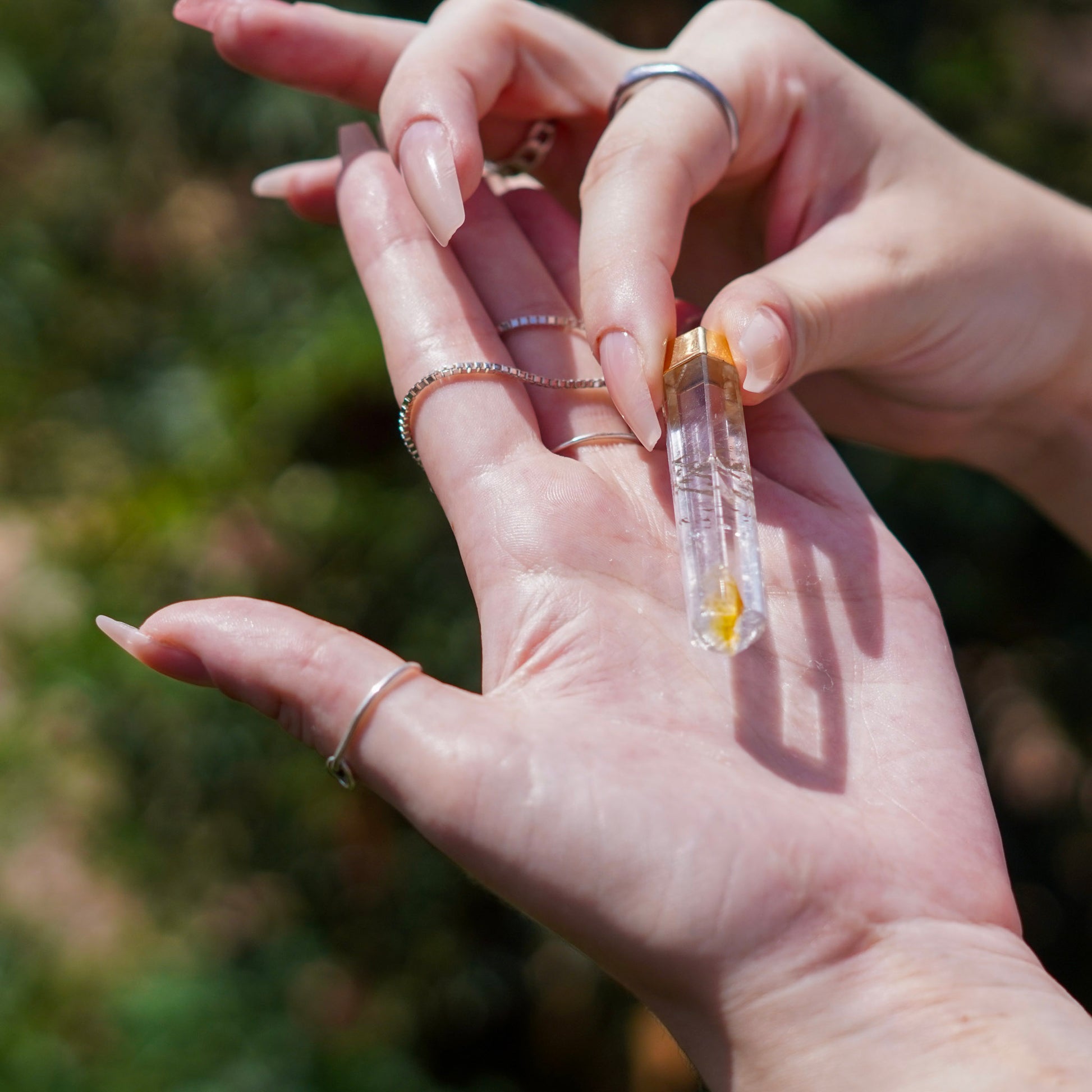 Brazilian Quartz Crystal Pendant with Hematoid Inclusions