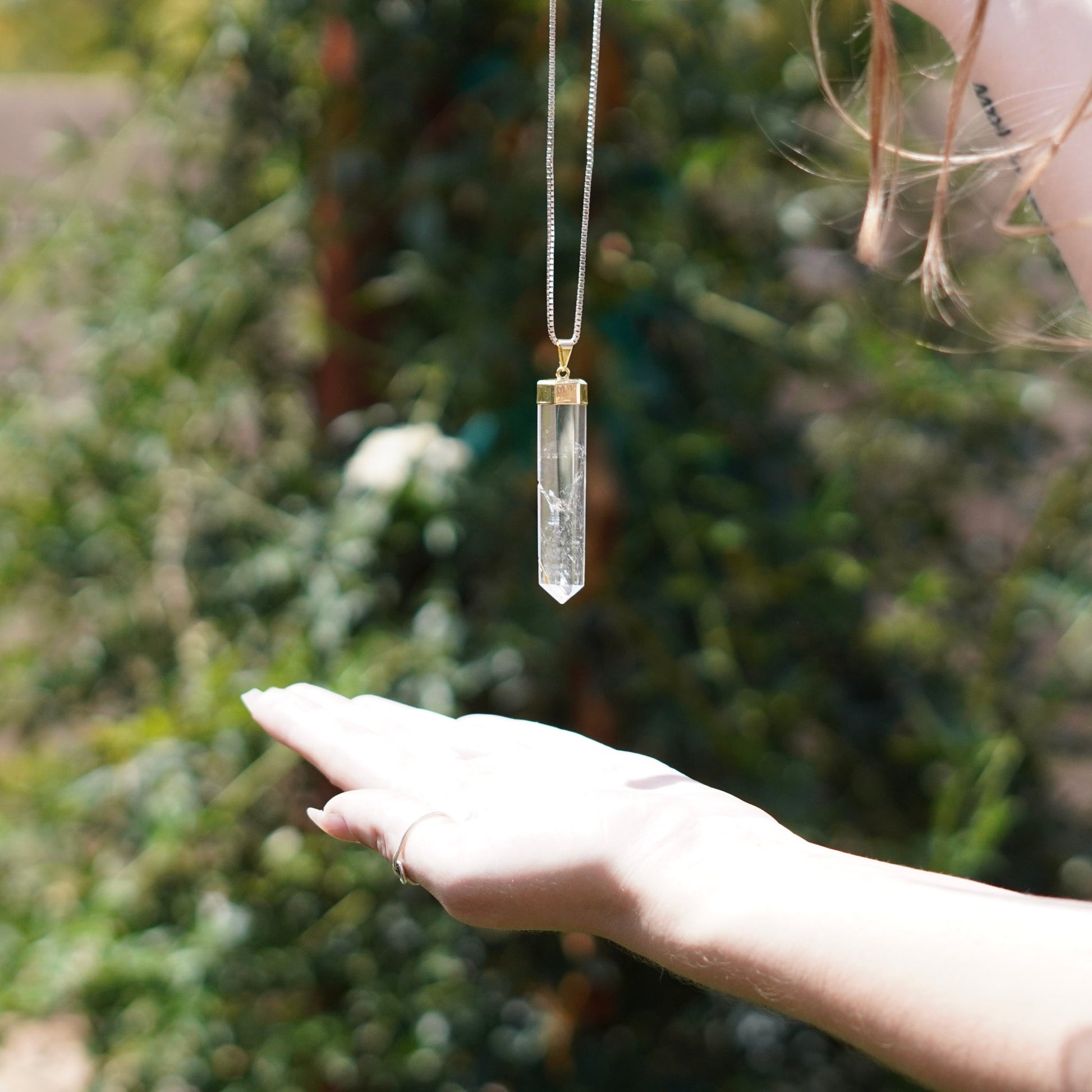 Brazilian Quartz Crystal Pendant with Hematoid Inclusions