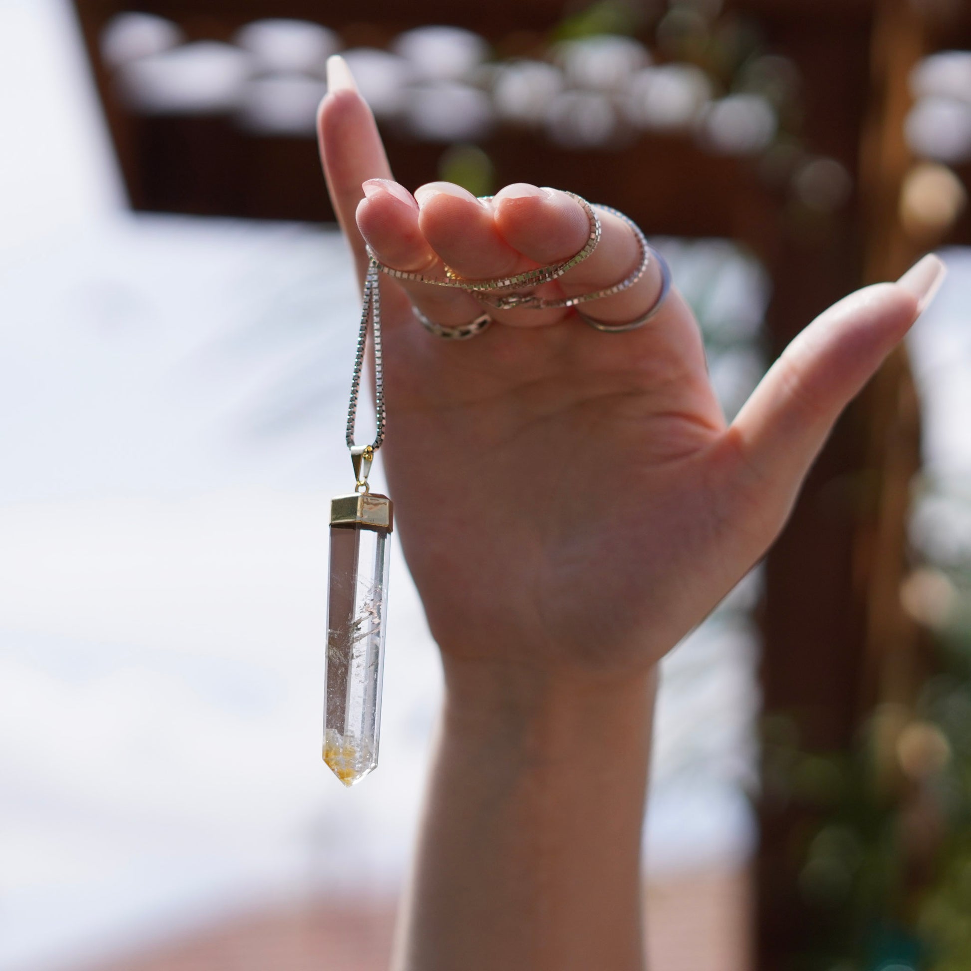 Brazilian Quartz Crystal Pendant with Hematoid Inclusions
