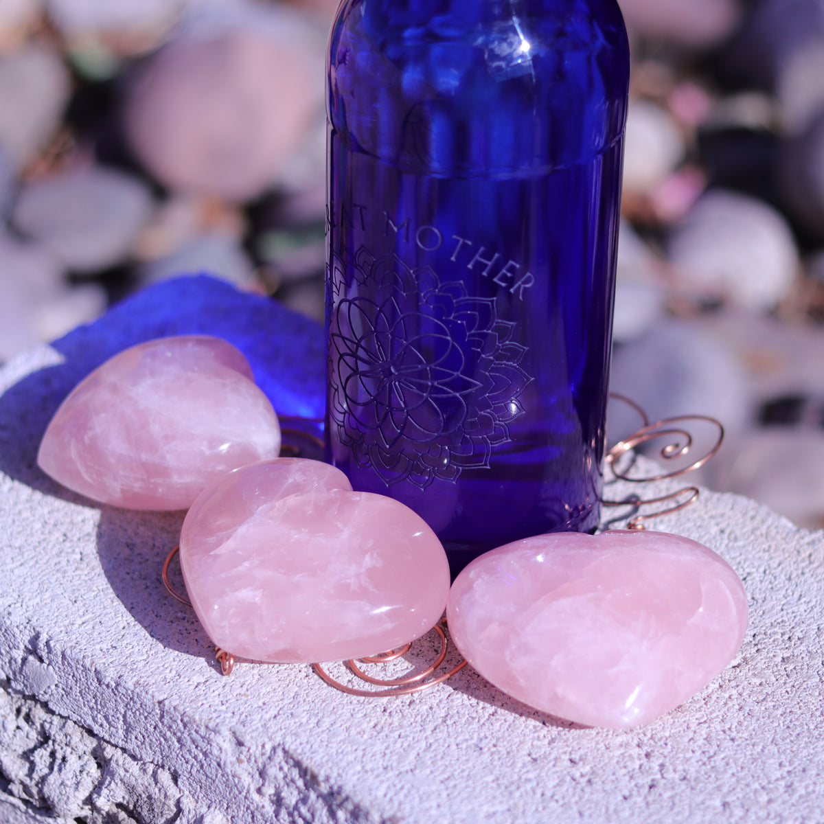 Rose Quartz Puffy Heart Carvings — Madagascar