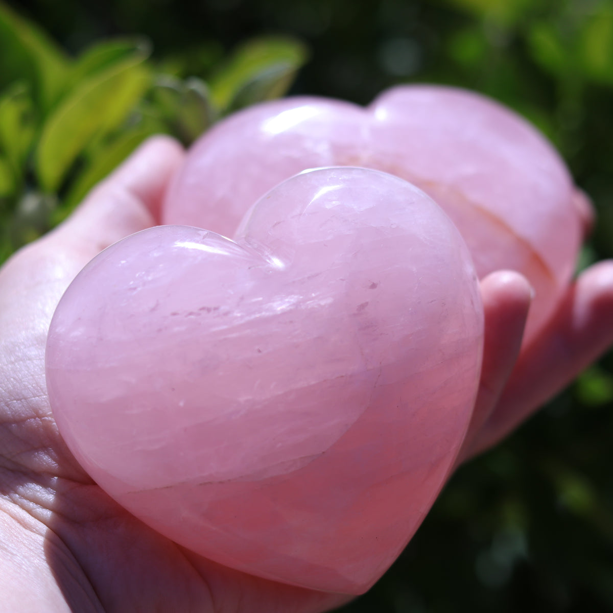 Rose Quartz Puffy Heart Carvings — Madagascar