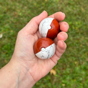 PokeBalls - Red Jasper and Howlite Sphere Carvings 40 mm