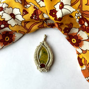 Incredible Unique Atlantisite Stone with Garnet in a Silver Wire Wrapped Setting