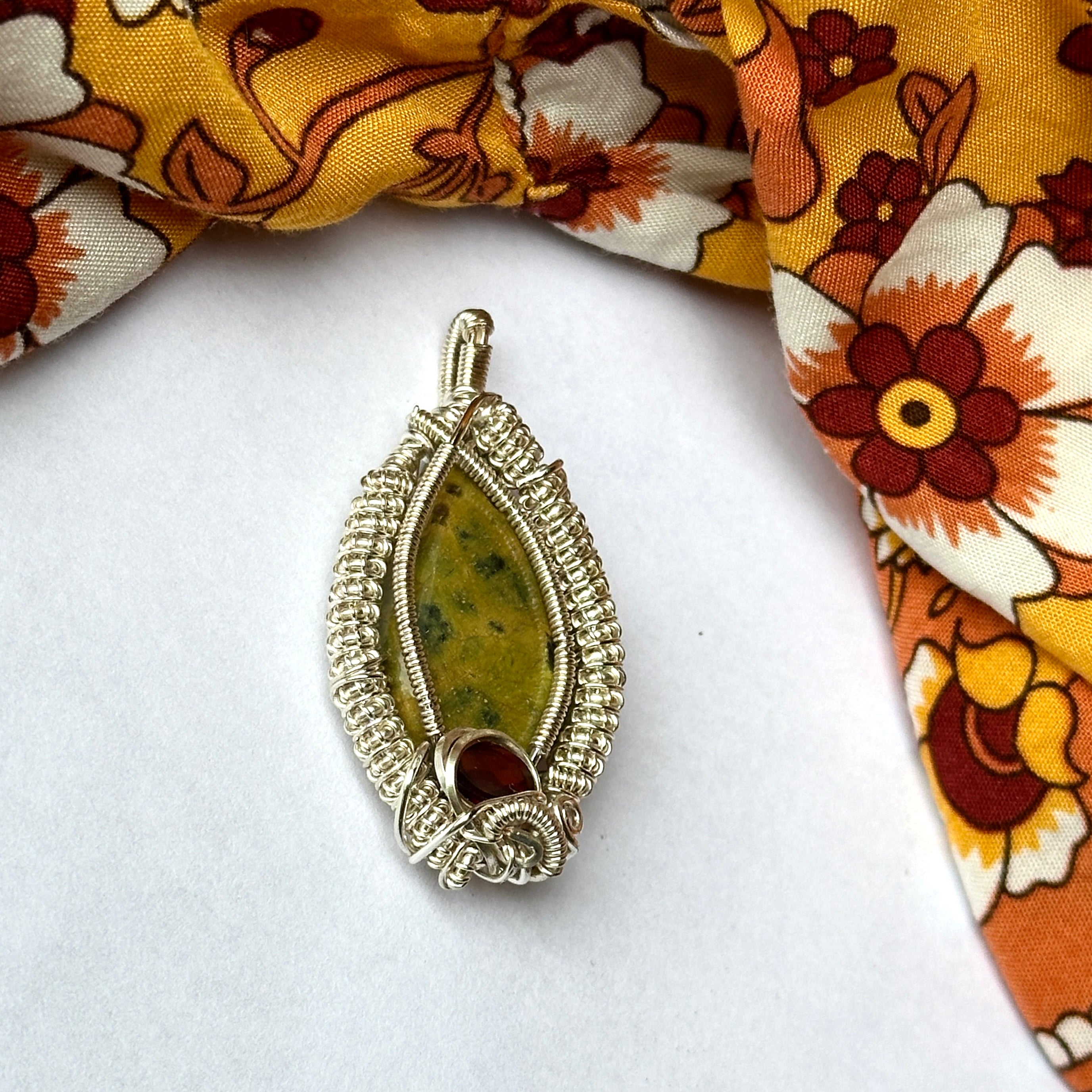Incredible Unique Atlantisite Stone with Garnet in a Silver Wire Wrapped Setting