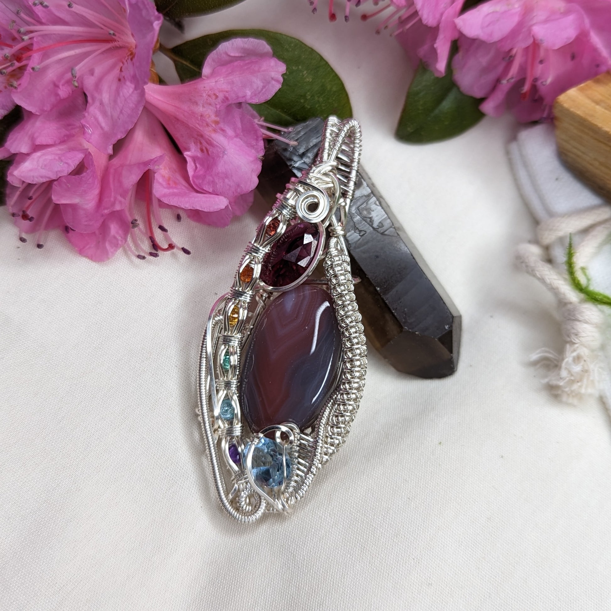 Botswana Agate Pendant with Garnet, Blue Topaz with a Rainbow Channel Setting ~ Wire Wrapped~ Includes Silver Chain - Earth Family Crystals
