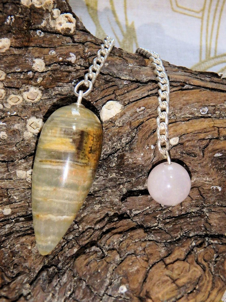 Gorgeous Patterns Aquatine Calcite Pendulum With Rose Quartz Bail - Earth Family Crystals