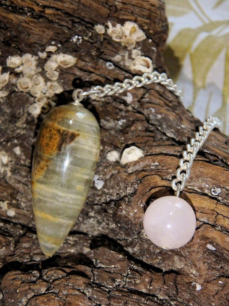 Gorgeous Patterns Aquatine Calcite Pendulum With Rose Quartz Bail - Earth Family Crystals