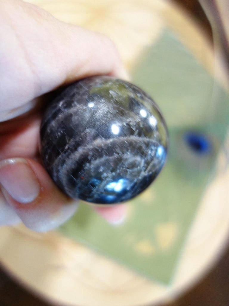 Glowing Rainbows Mysterious Black Moonstone Sphere - Earth Family Crystals