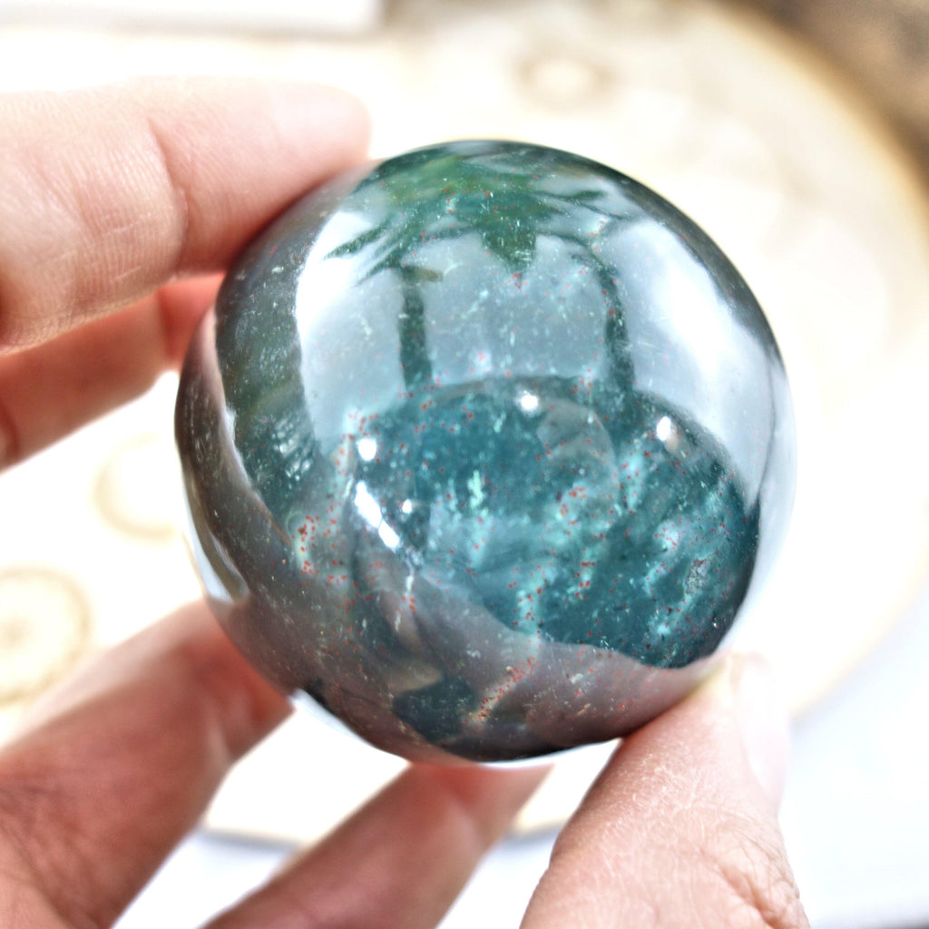Shiny Deep Green Bloodstone Sphere Carving - Earth Family Crystals