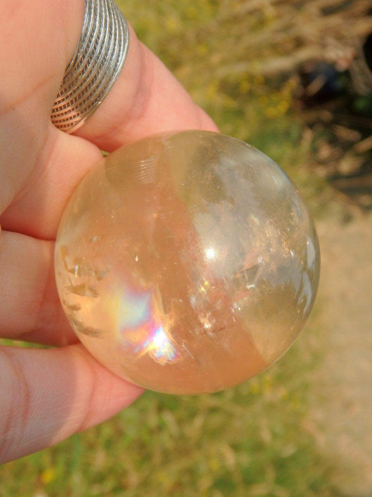 Dancing Rainbows Golden Honey Calcite Sphere Carving - Earth Family Crystals