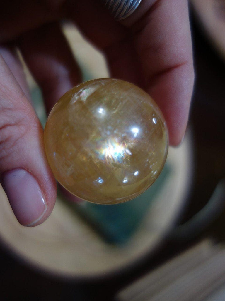 Beautiful Rainbows Optical Golden Calcite Small Sphere - Earth Family Crystals