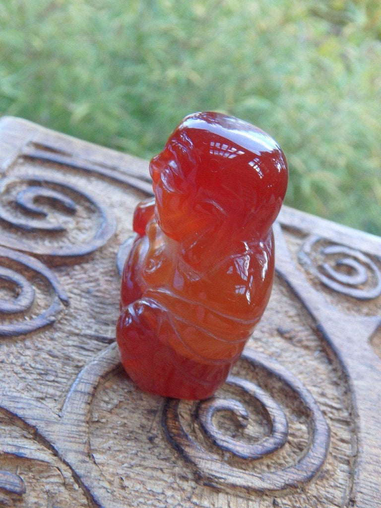 Carnelian Small Laughing Buddha Carving - Earth Family Crystals