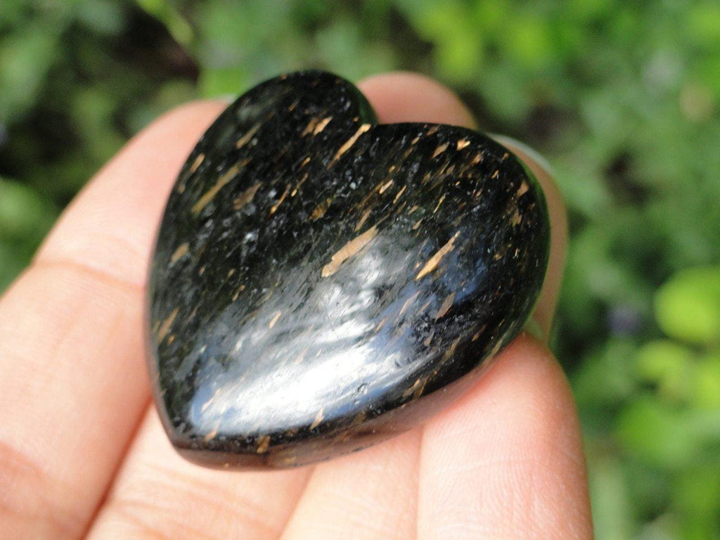 NUUMMITE HEART WITH GOLDEN FLASH FROM GREENLAND - Earth Family Crystals