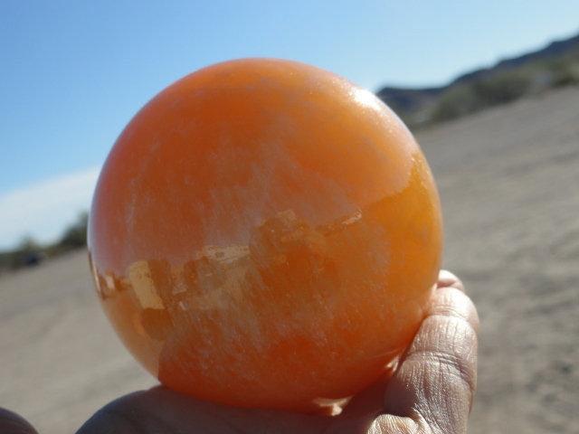 Giant ORANGE CALCITE SPHERE - Earth Family Crystals