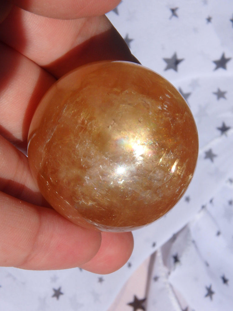 Uplifting Optical Golden Honey Calcite Sphere Carving With Rainbows 3 - Earth Family Crystals