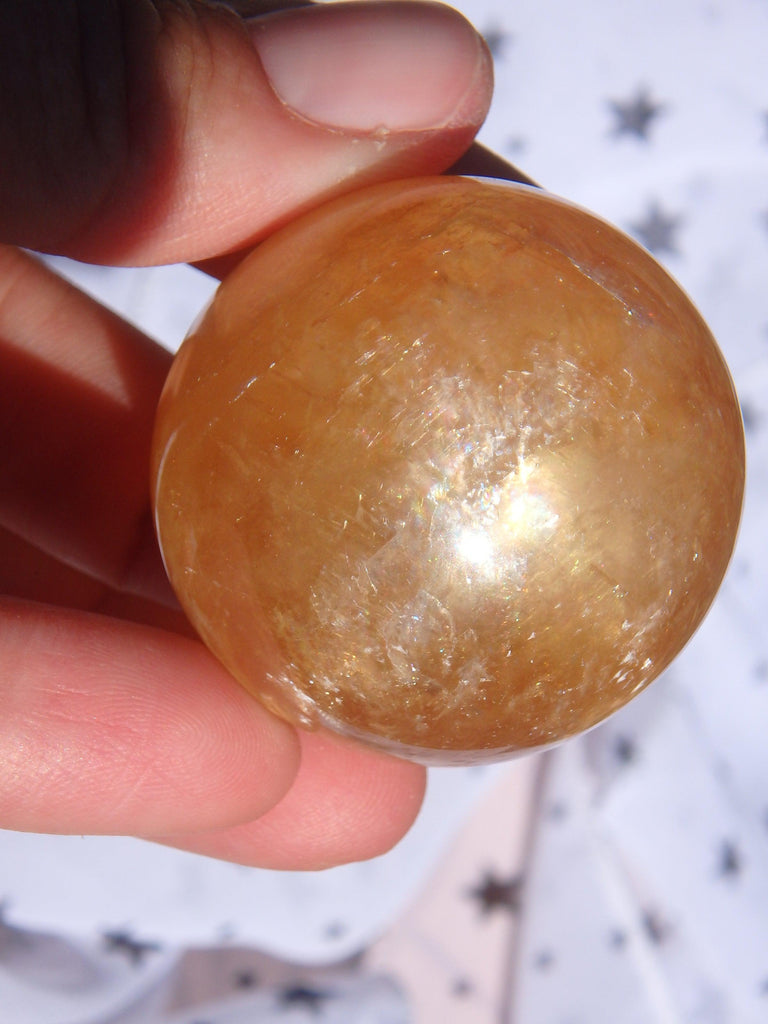 Uplifting Optical Golden Honey Calcite Sphere Carving With Rainbows 3 - Earth Family Crystals