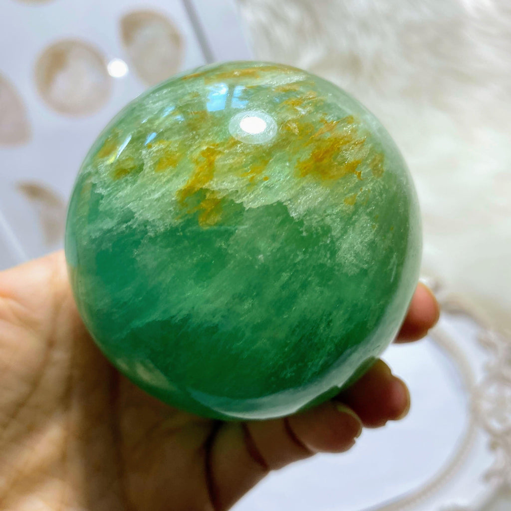 Incredibly Vibrant XL Green Fluorite Sphere Carving (Includes Wood Stand) - Earth Family Crystals