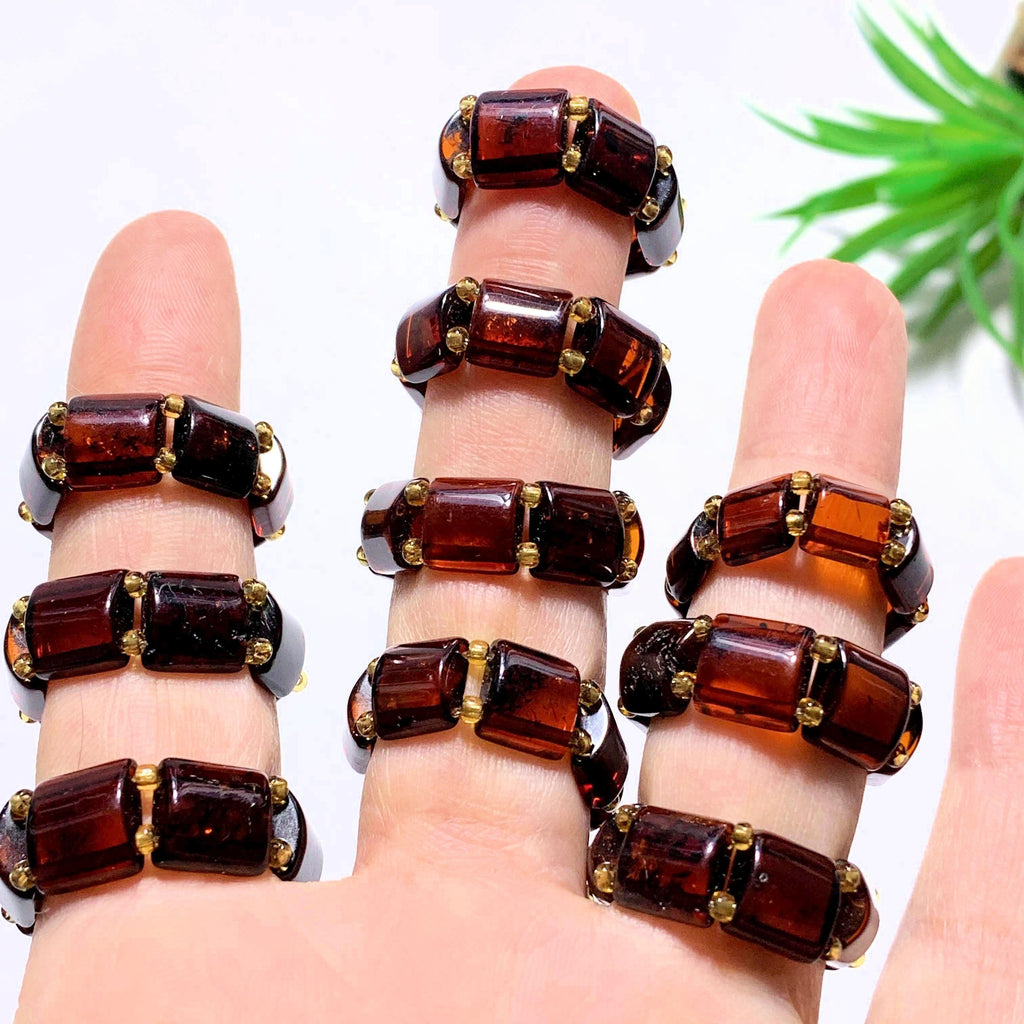 One Genuine Cherry Baltic Amber Ring on Stretchy Cord (Adjustable- Size 7-11) - Earth Family Crystals
