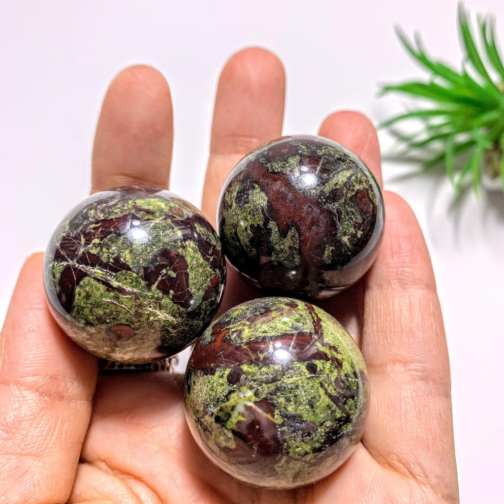 One Dragon Blood Jasper Sphere Carving - Earth Family Crystals