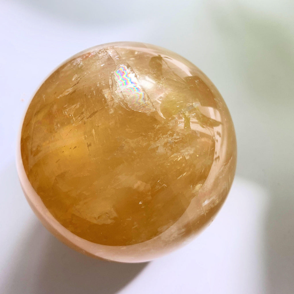 Incredible XL Golden Calcite With Rainbows Sphere Carving - Earth Family Crystals