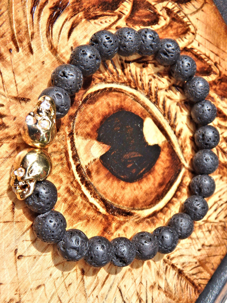 Lava Stone Bracelet With Double Golden Skull Charms (Perfect for Essential Oils & Perfume) - Earth Family Crystals