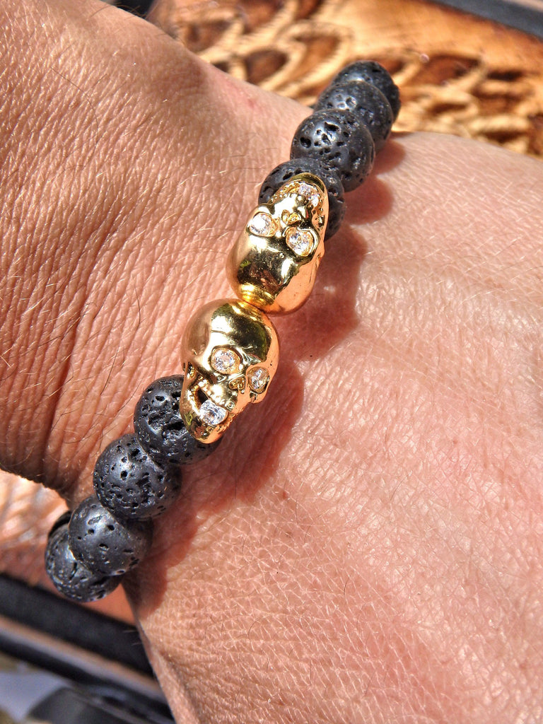 Lava Stone Bracelet With Double Golden Skull Charms (Perfect for Essential Oils & Perfume) - Earth Family Crystals