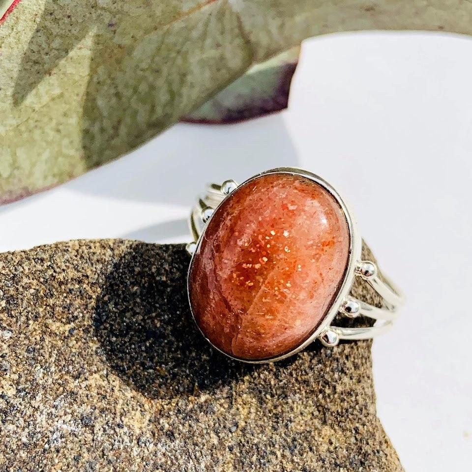 Mysterious Sparkles Orange Sunstone Ring in Sterling Silver (Size 11) - Earth Family Crystals