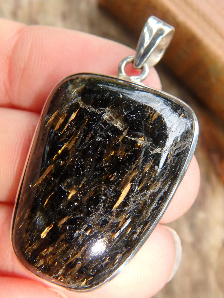 Dancing Golden Flashes Genuine Nuummite Pendant In Sterling Silver (Includes Silver Chain)1 - Earth Family Crystals