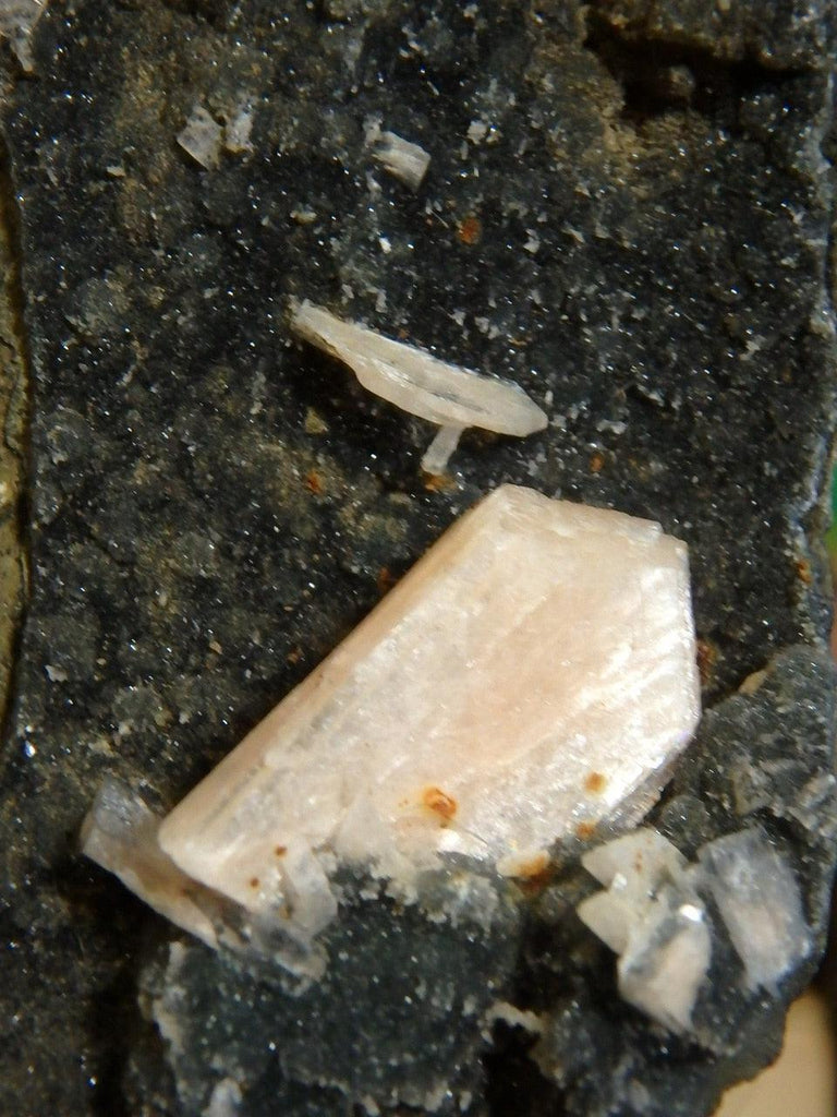 Pink Stilbite on Black Chalcedony Matrix - Earth Family Crystals