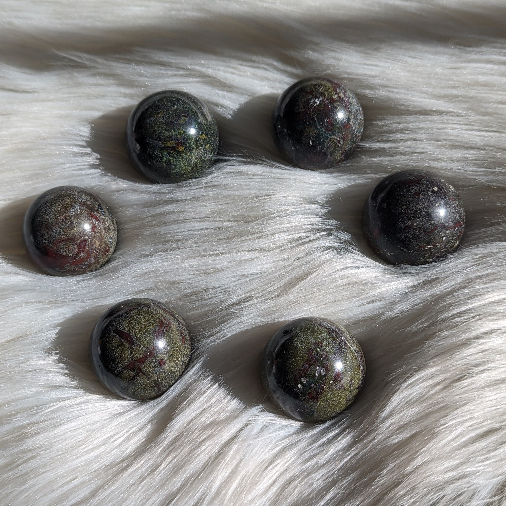 One Dragons Blood Jasper Sphere Carving - Earth Family Crystals
