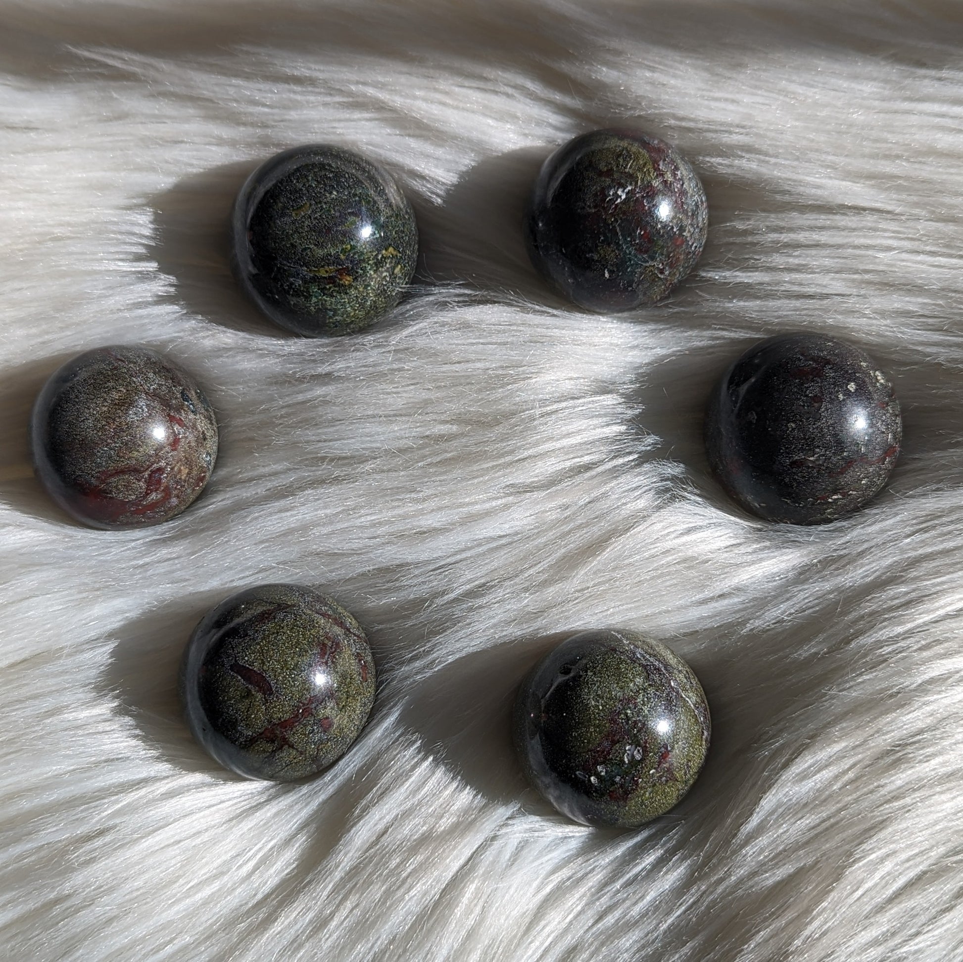 One Dragons Blood Jasper Sphere Carving - Earth Family Crystals