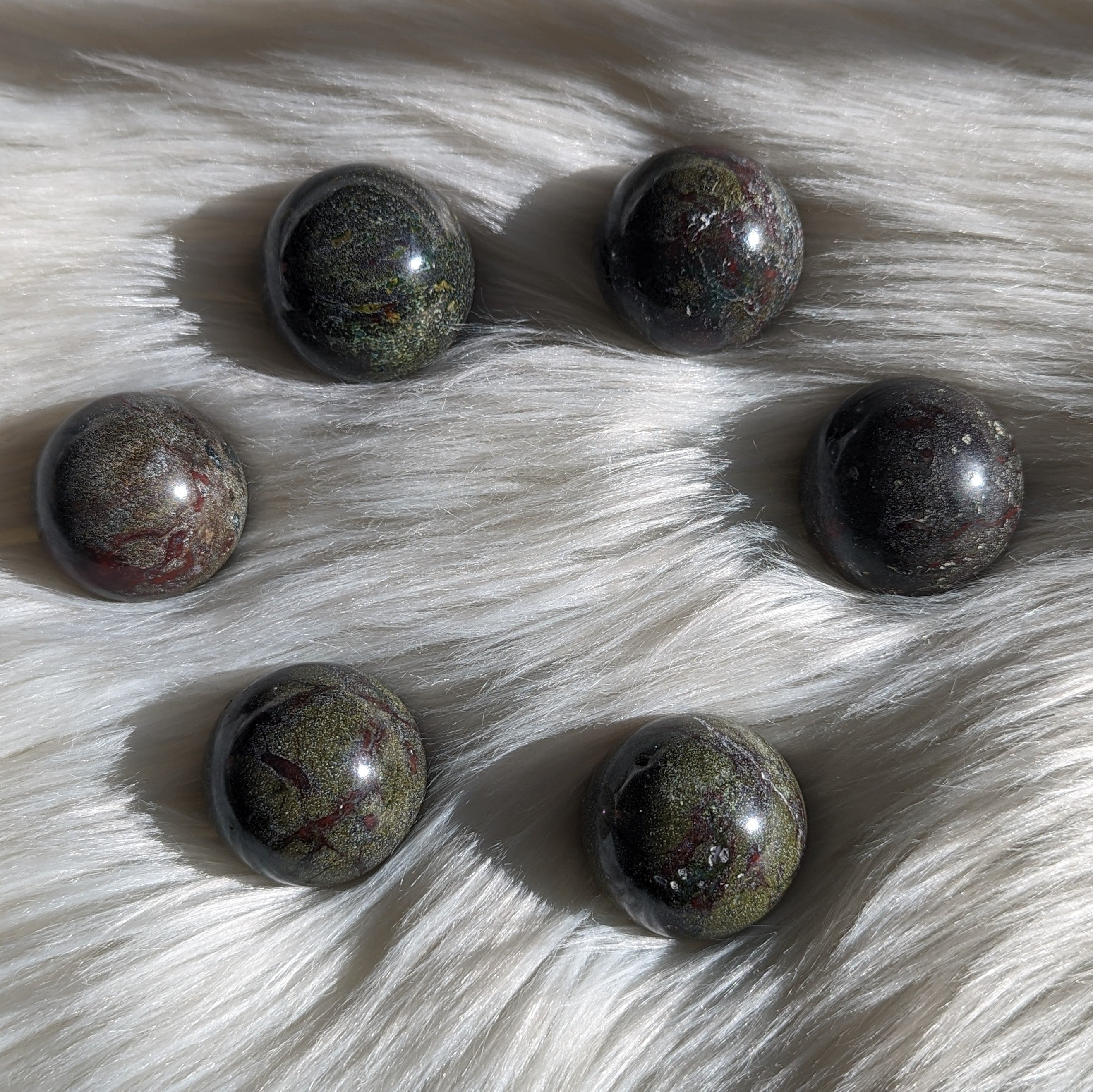 One Dragons Blood Jasper Sphere Carving - Earth Family Crystals