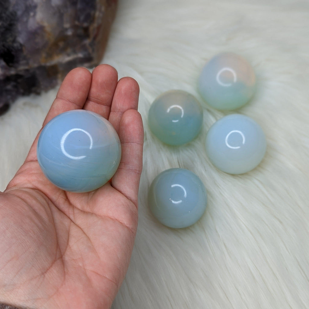 Opalite Glass Sphere Carving - Earth Family Crystals