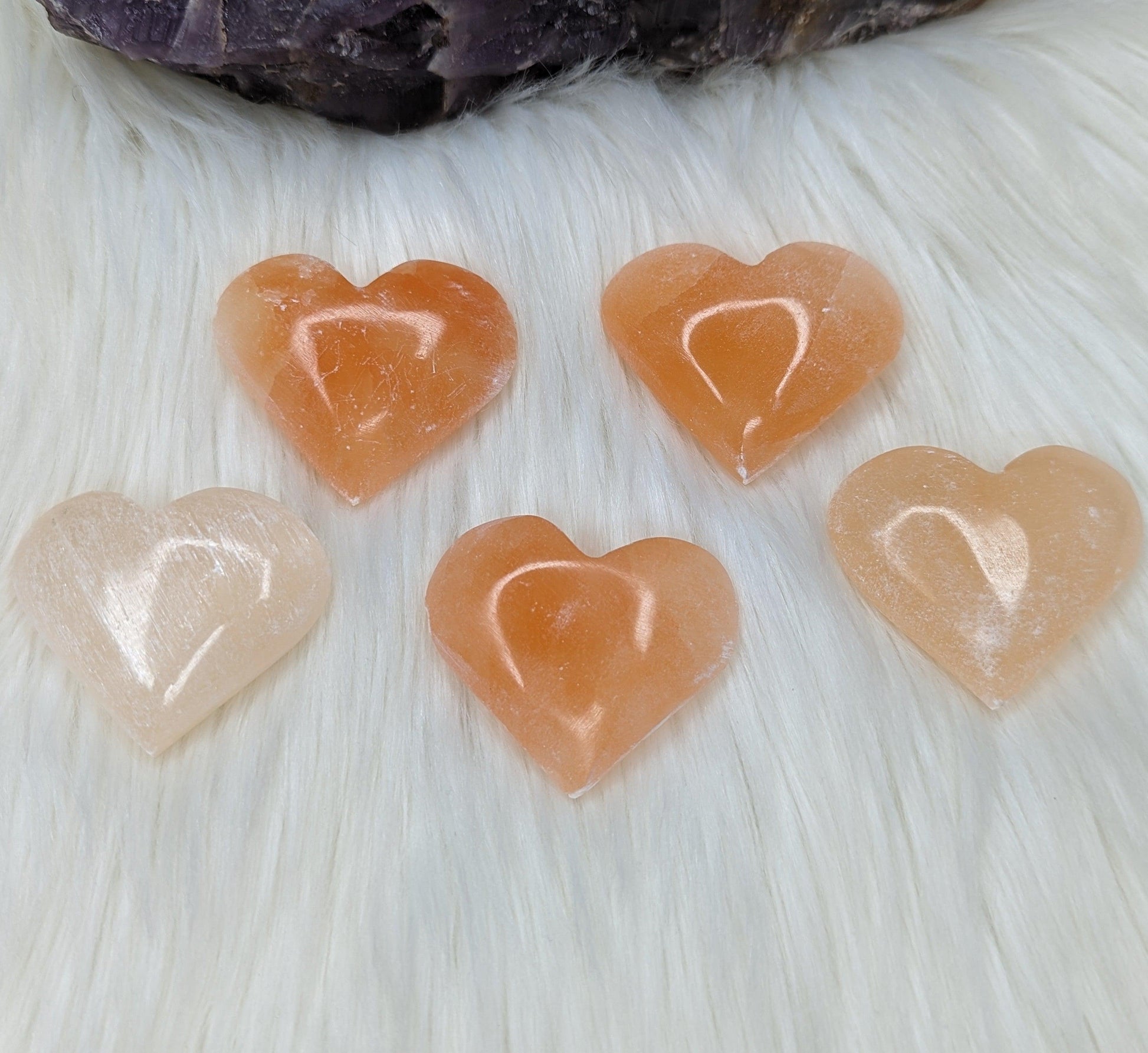 Orange Selenite Palm Stone Heart Carving - Earth Family Crystals