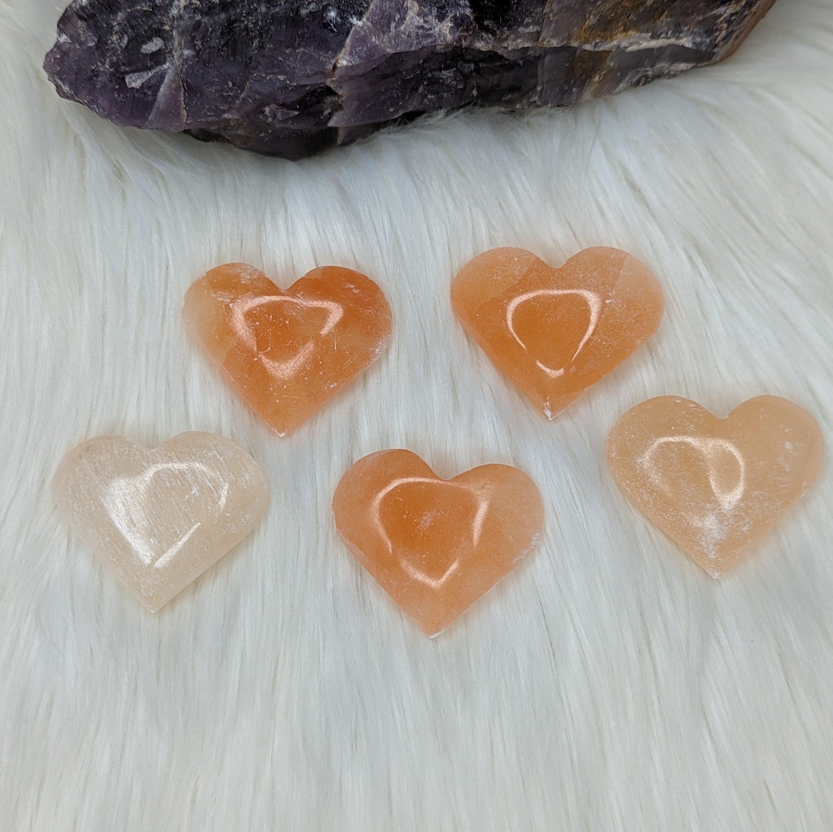 Orange Selenite Palm Stone Heart Carving - Earth Family Crystals