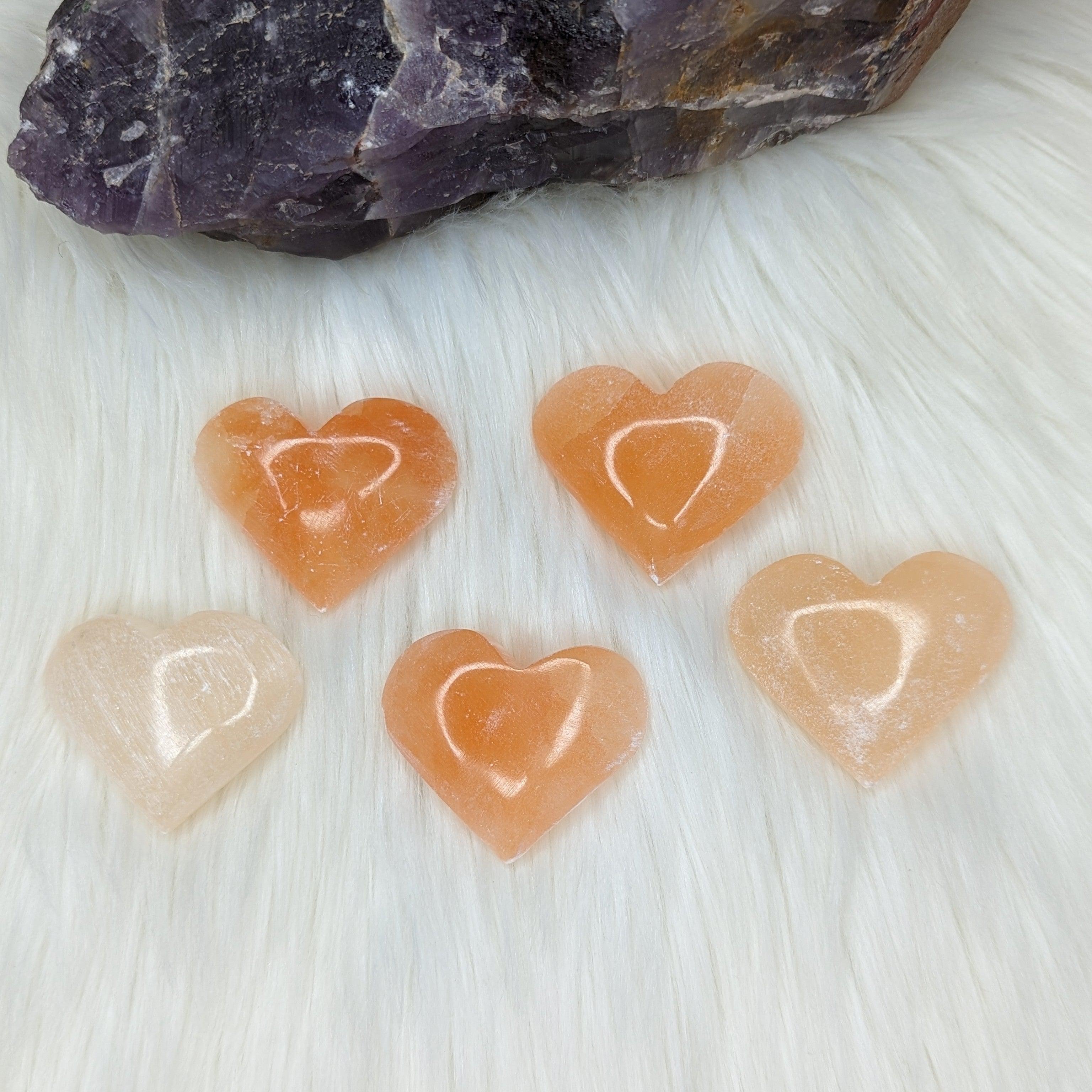 Orange Selenite Palm Stone Heart Carving - Earth Family Crystals