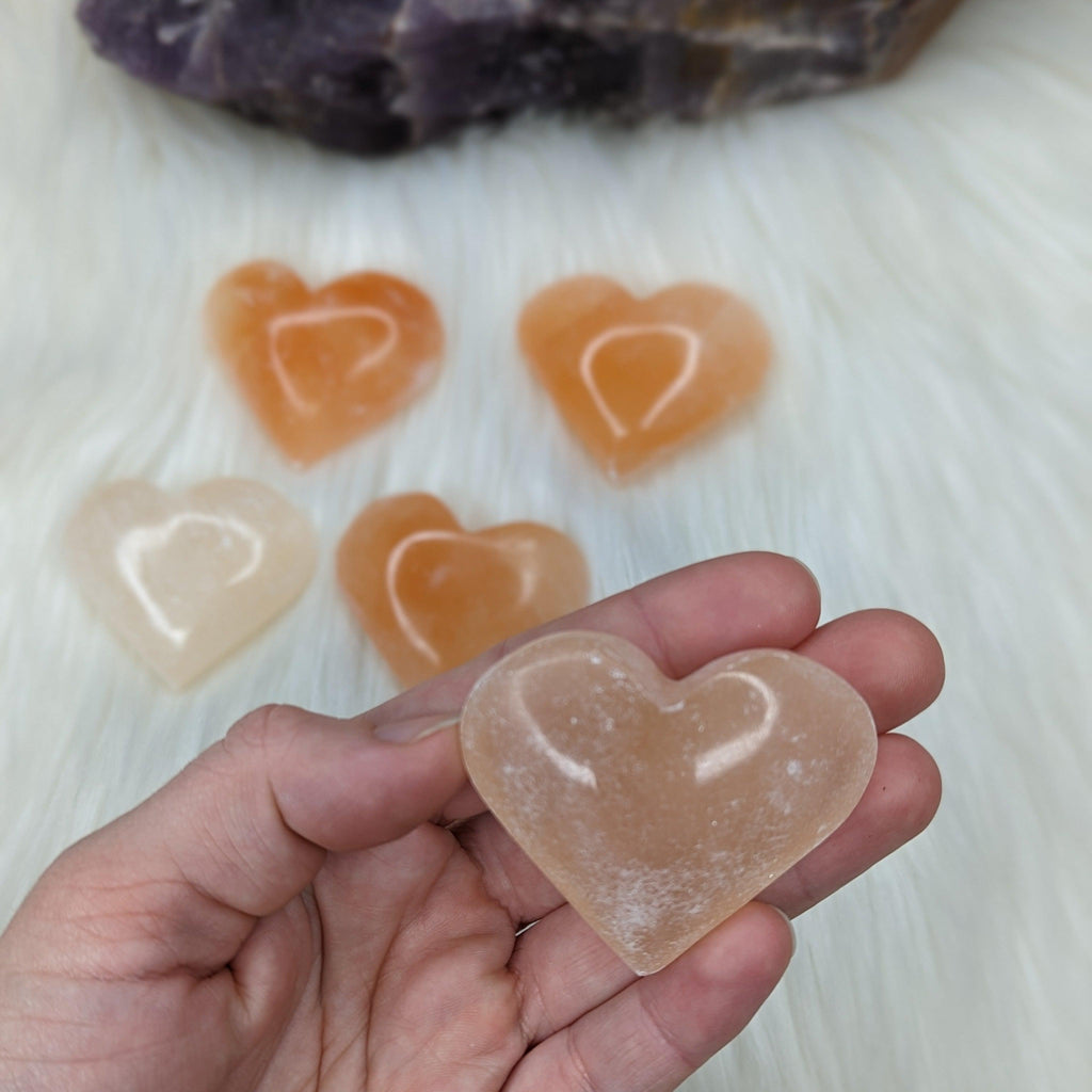 Orange Selenite Palm Stone Heart Carving - Earth Family Crystals
