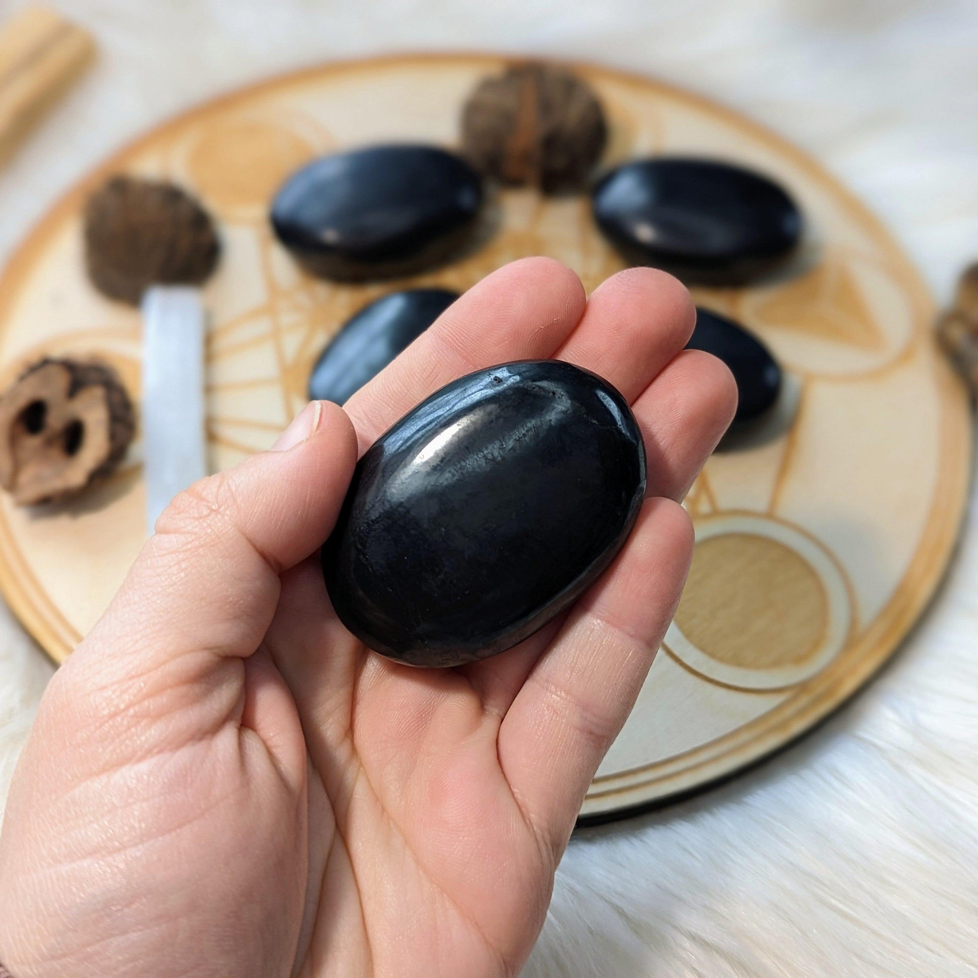 Shungite Palm Stone Carvings ~ protective and detoxifying - Earth Family Crystals
