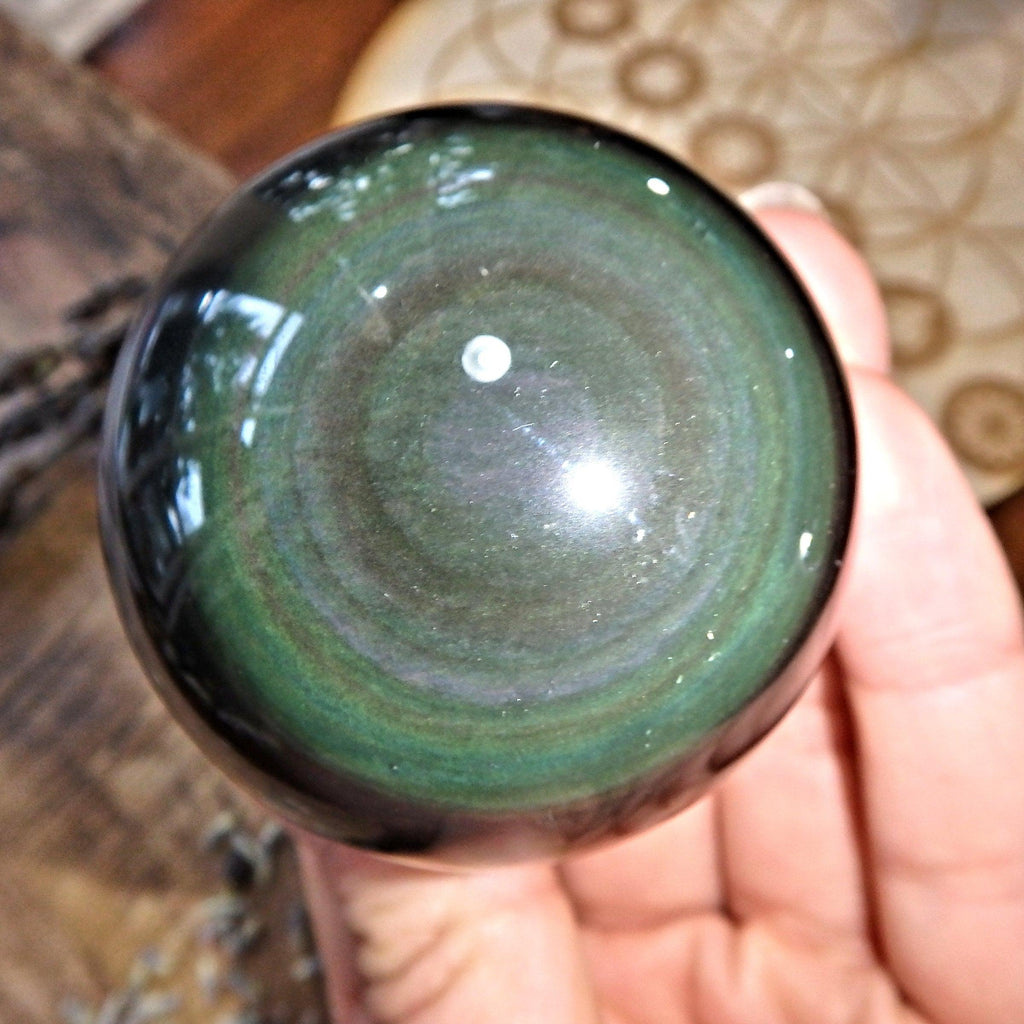Mysterious Flashes of Color Rainbow Obsidian Sphere Carving 8 - Earth Family Crystals