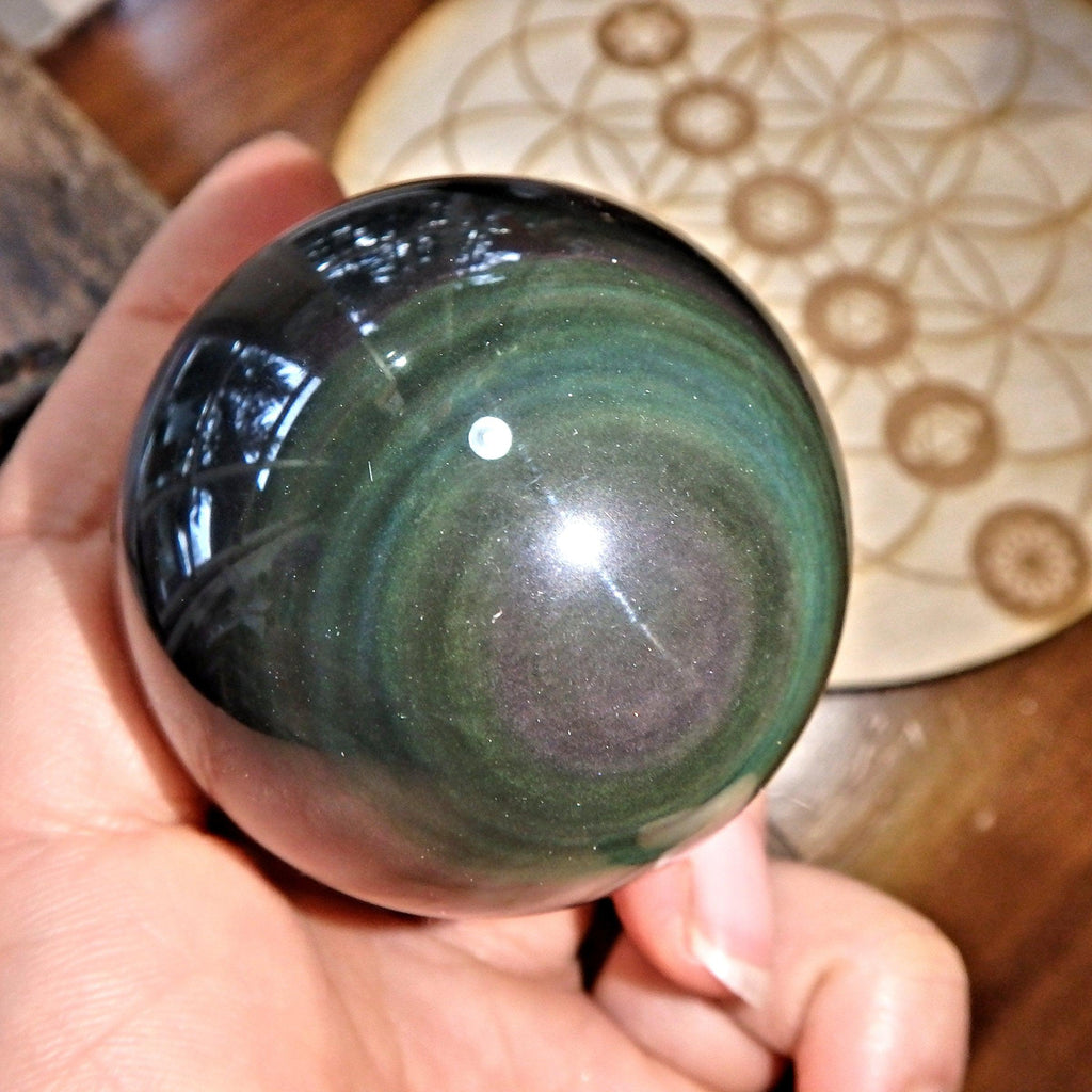 Mysterious Flashes of Color Rainbow Obsidian Sphere Carving 8 - Earth Family Crystals