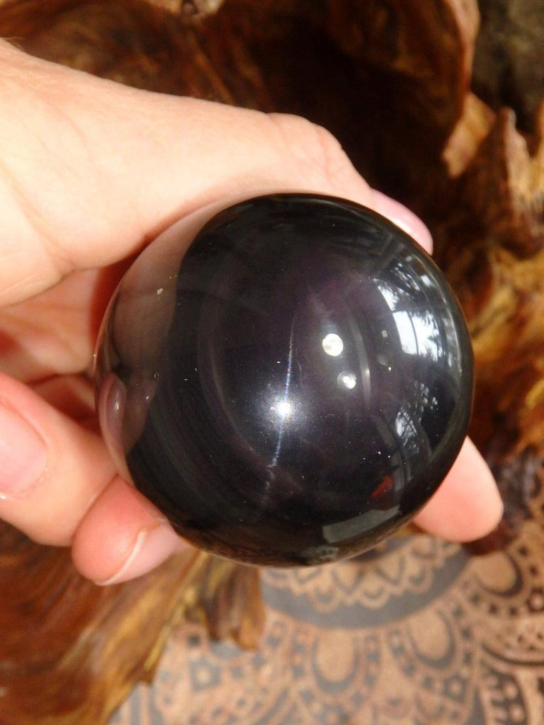 Mysterious Flashes Rainbow Obsidian Sphere Carving - Earth Family Crystals