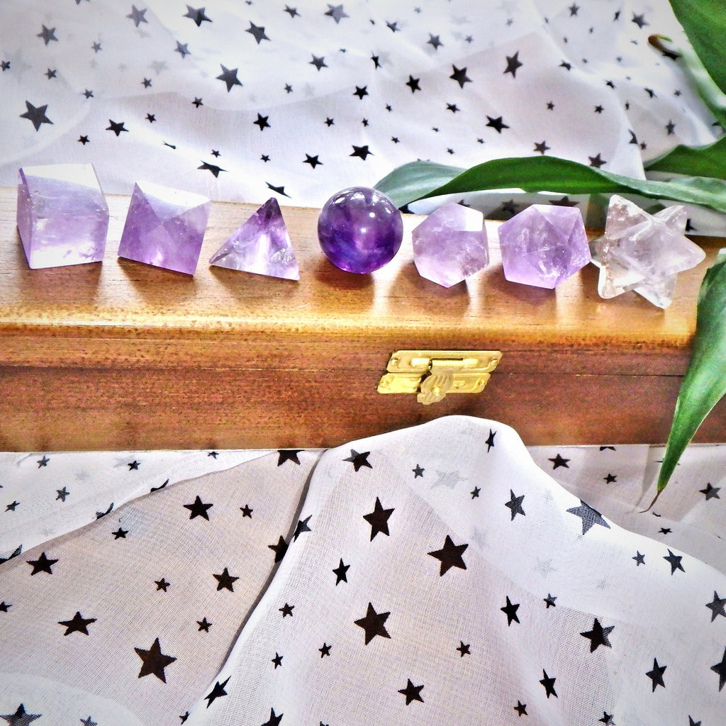 Complete 7 Stone Amethyst  Sacred Geometry (Platonic solids) Carvings in Protective Wood Case - Earth Family Crystals