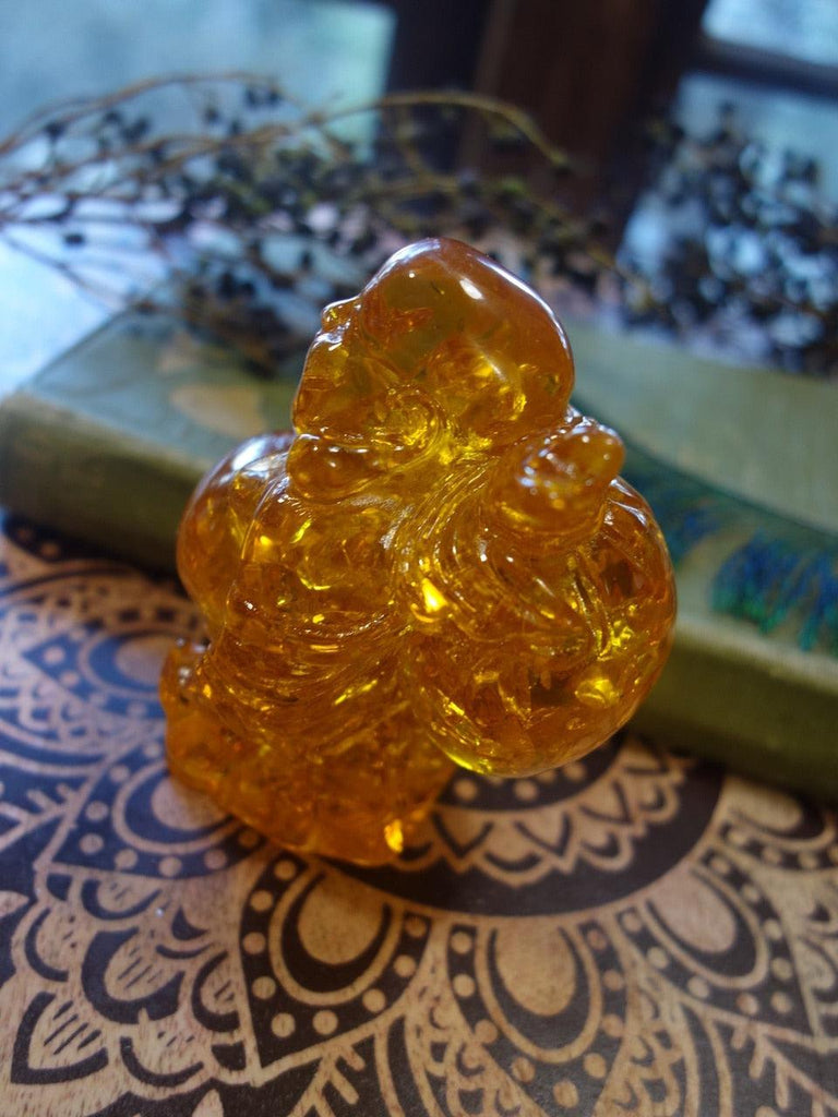 Vibrant Reconstituted Amber Buddha Carving - Earth Family Crystals