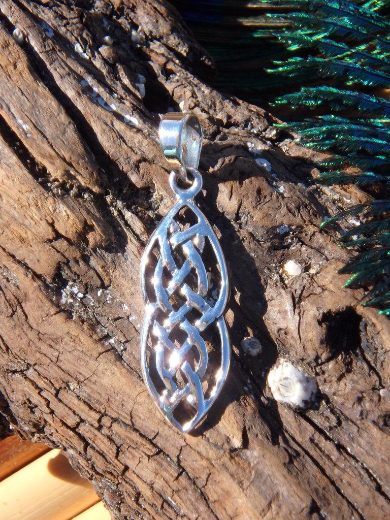 Long Celtic Knot Sterling Silver Pendant - Earth Family Crystals