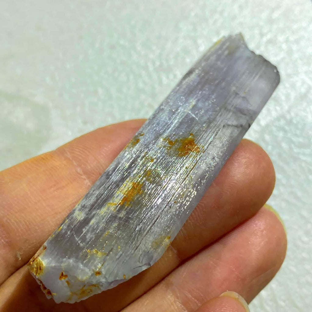 kunzite a green and purple spodumene crystal - Earth Family Crystals