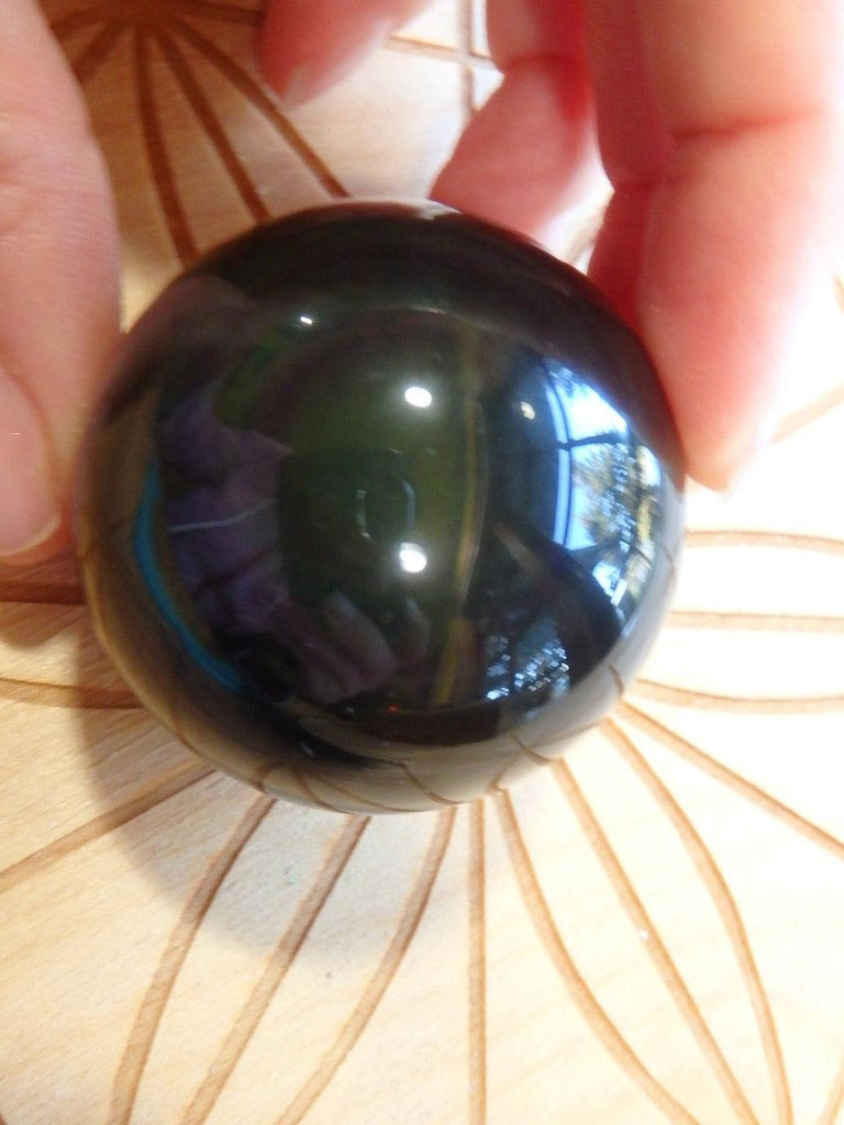 Gorgeous Rainbow Obsidian Sphere Carving - Earth Family Crystals