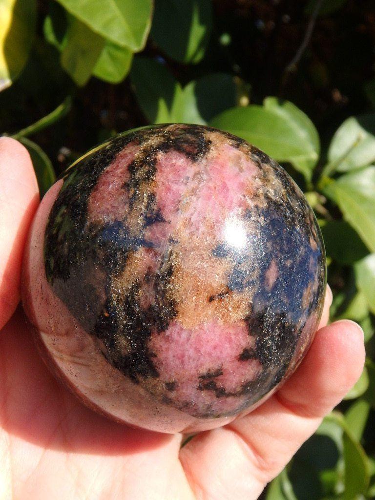 Cranberry Pink & Bold Black Rhodonite Sphere - Earth Family Crystals